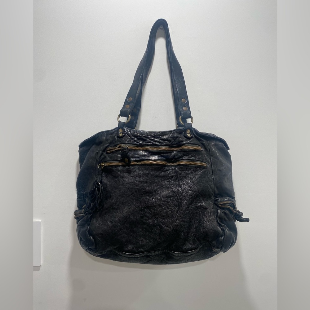 Johnny was leather shoulder bag